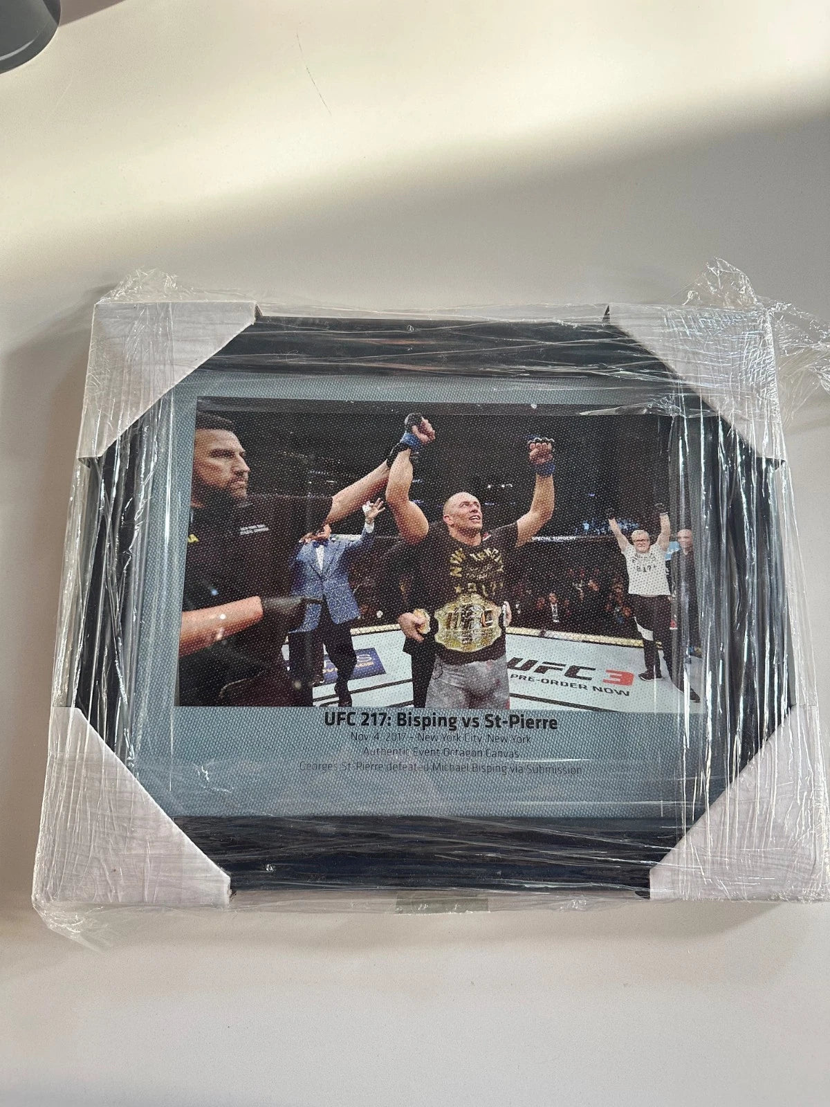 UFC 217 Fight Used Octagon Framed Collage | Bisping vs. St-Pierre